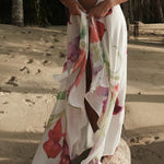 Floral wrap co-ord set with vibrant red and purple flowers on white — Sydney Lane | Endless UAE