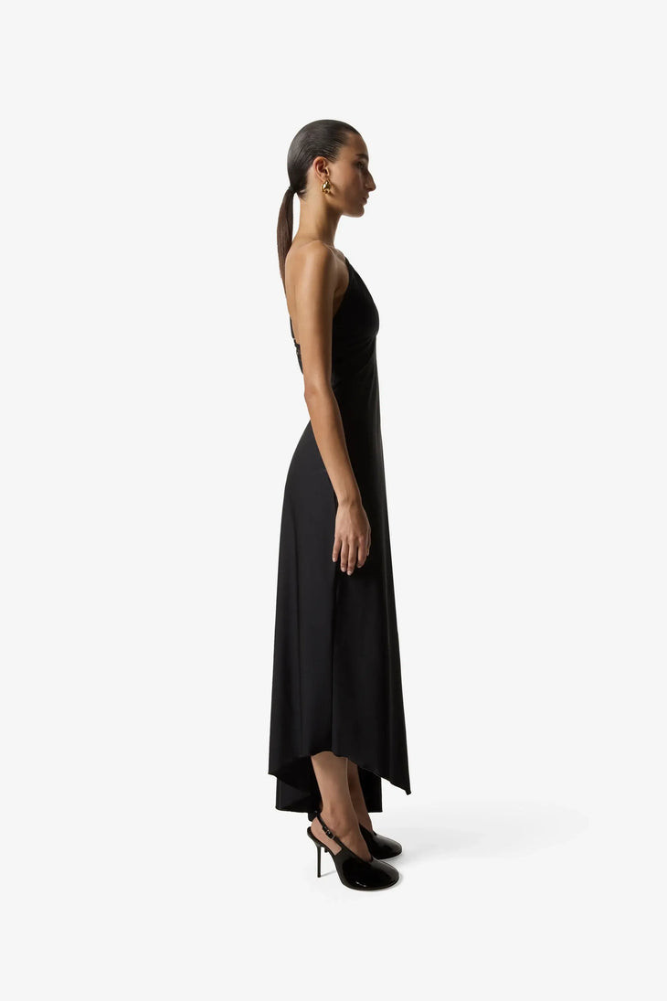 Elegant black asymmetric long dress with sleeveless design and uneven hemline, side view — Coperni | Endless UAE