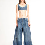 Wide-leg balloon ripped jeans with distressed knee detail in medium blue wash — Mrs. Keepa | Endless UAE