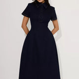 Woman wearing navy cotton denim collared midi dress with short sleeves — Endless | Endless UAE