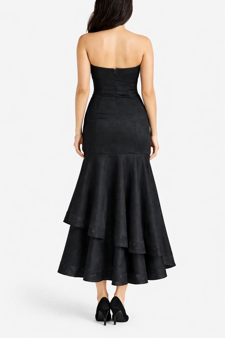 Black strapless midi dress with fitted bodice and dramatic tiered ruffle hem, shown from back view — Coast | Endless UAE