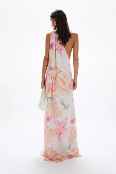 Woman wearing pastel pink and peach Bohemia Maxi Dress with abstract star print — Cin Cin | Endless UAE