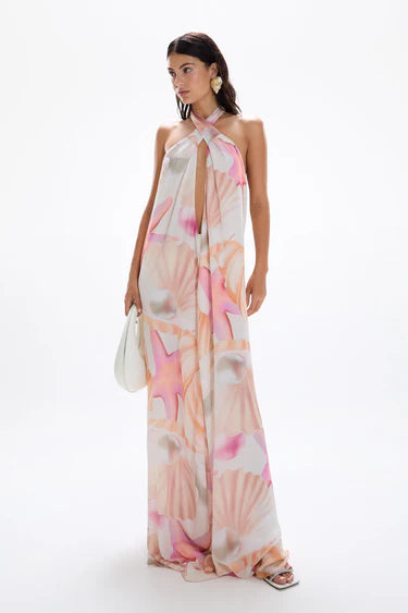 Woman wearing pastel pink and peach Bohemia Maxi Dress with abstract star print — Cin Cin | Endless UAE