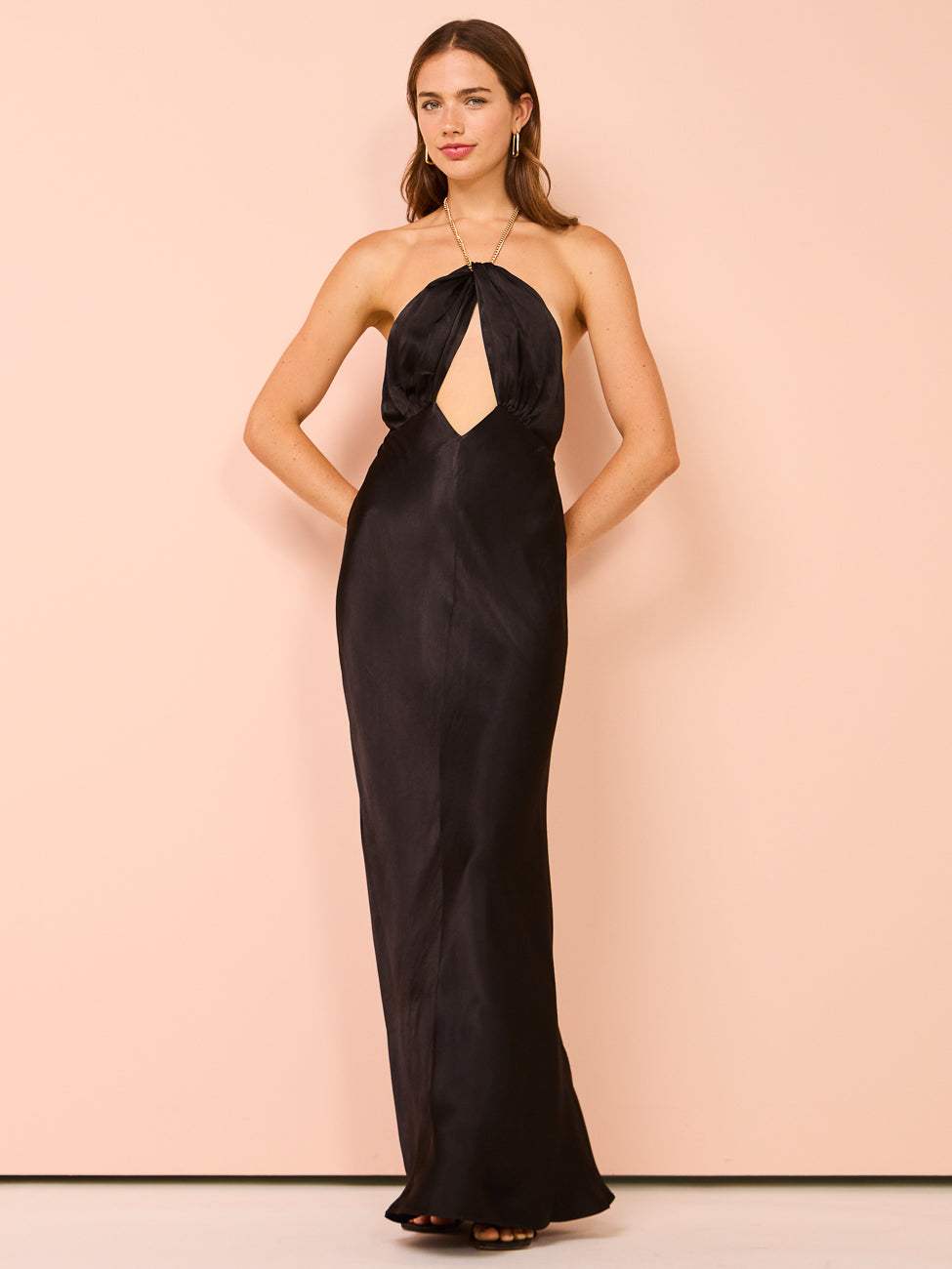 Black satin halter neck maxi dress with keyhole cutout and gold chain neckline detail — Shona Joy | Endless UAE