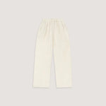 Woman wearing cream linen blend strapless blouse and wide-leg pants — Leo Lin | Endless UAE