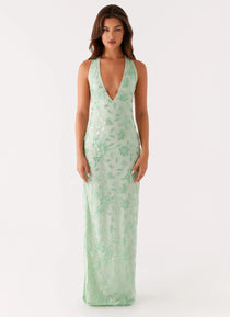 Model wearing Cydney Beaded Maxi Dress in mint green with floral embellishments and plunging neckline — Peppermayo | Endless UAE