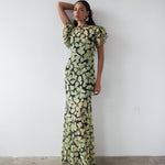 Bougainvillea Maxi Dress in cream and black floral print with ruffled sleeves — De La Vali | Endless UAE