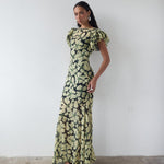 Bougainvillea Maxi Dress in cream and black floral print with ruffled sleeves — De La Vali | Endless UAE