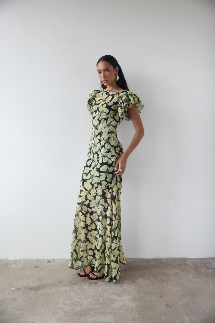 Bougainvillea Maxi Dress in cream and black floral print with ruffled sleeves — De La Vali | Endless UAE