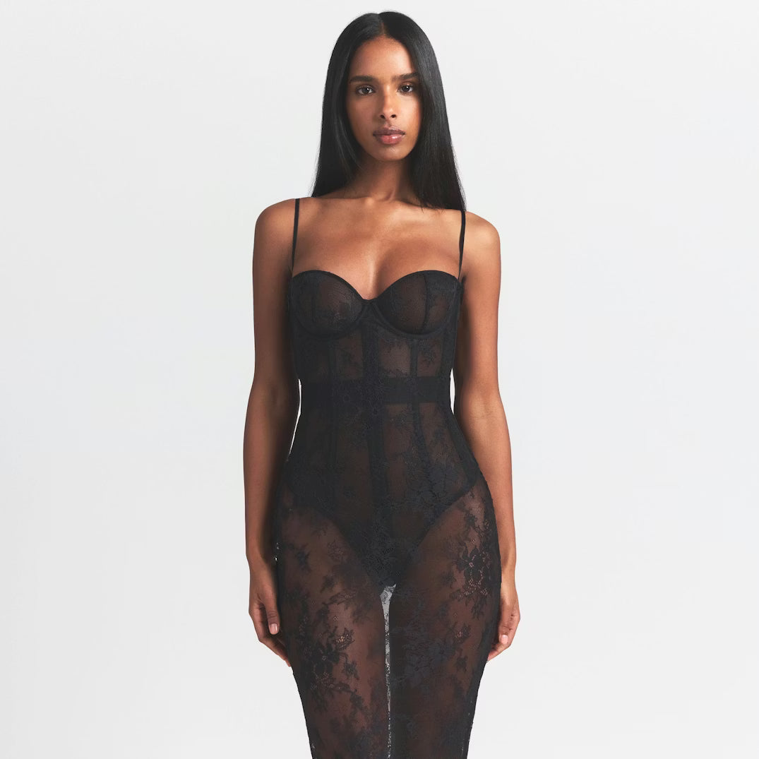 Black strapless corset long dress with lace detailing and sheer panels — Skims | Endless UAE