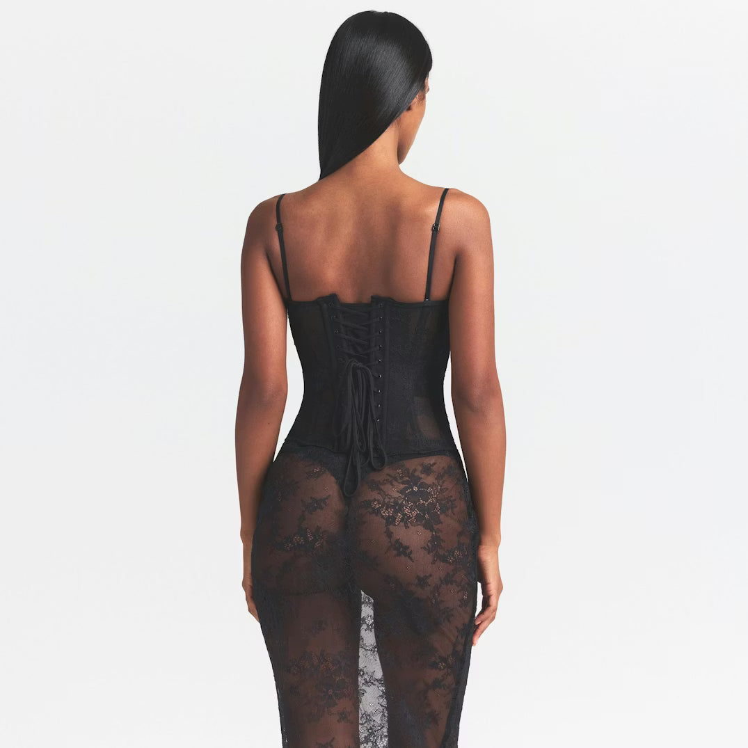 Black strapless corset long dress with lace detailing and sheer panels — Skims | Endless UAE