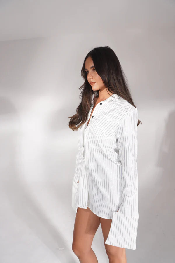 White pinstriped shirt dress styled as mini dress with pointed toe heels — Deme Studio | Endless UAE