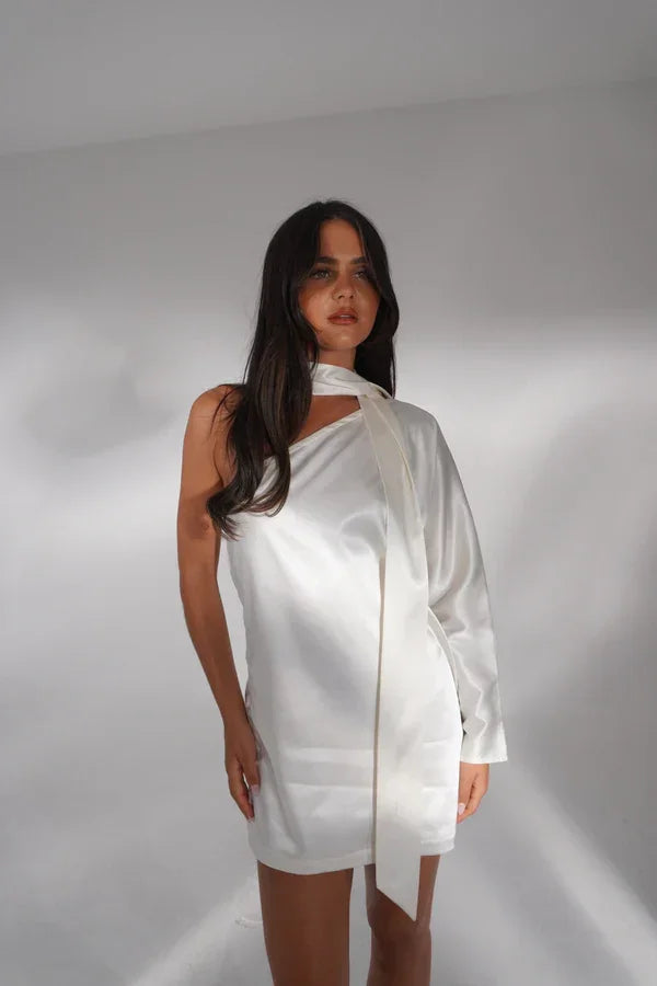 White one-shoulder mini dress with long sleeve on mannequin — Deme Studio | Endless UAE