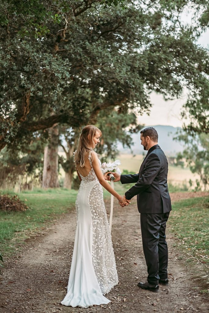 Naomi wedding dress by JESSICA COUTURE features delicate lace detailing with elegant backless design — JESSICA COUTURE | Endless UAE