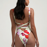 Floral wrap co-ord set with vibrant red and purple flowers on white — Sydney Lane | Endless UAE