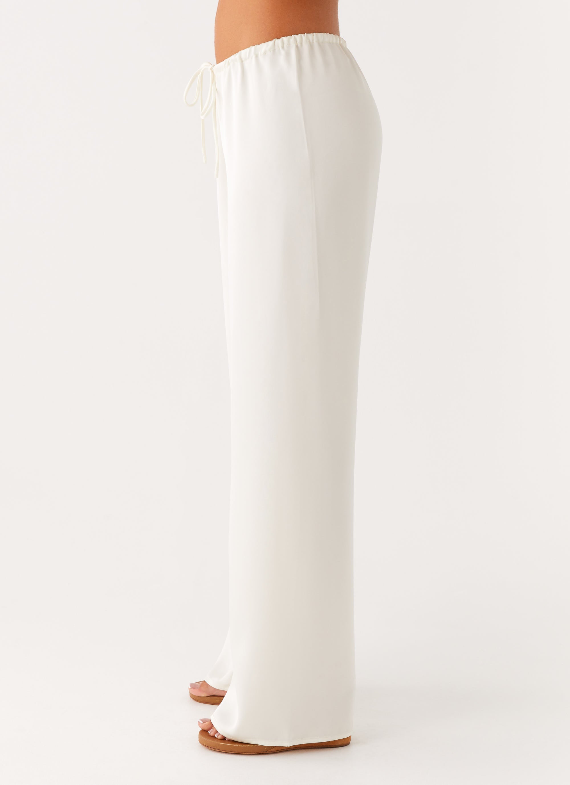 Cream low rise wide leg pants with drawstring waist — Peppermayo | Endless UAE