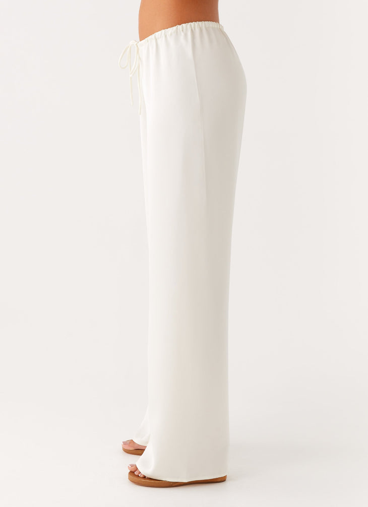 Cream low rise wide leg pants with drawstring waist — Peppermayo | Endless UAE