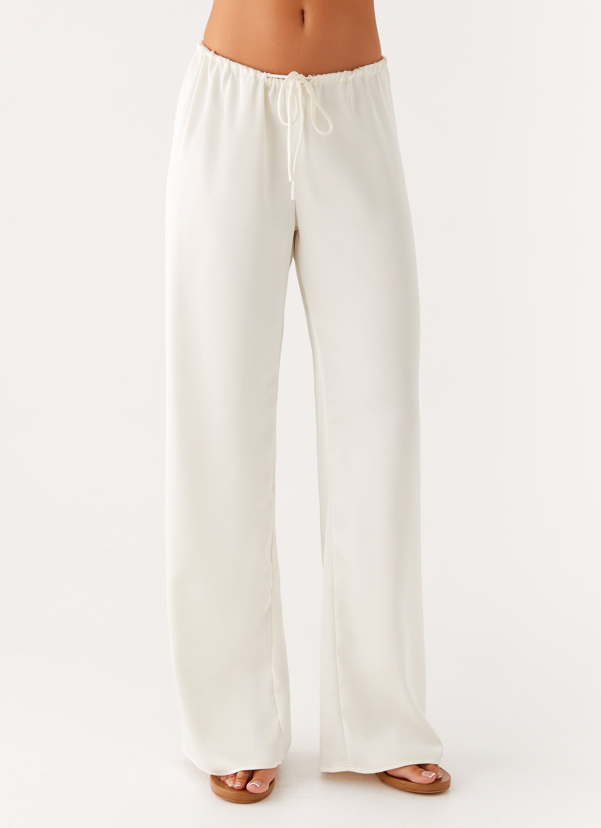 Cream low rise wide leg pants with drawstring waist — Peppermayo | Endless UAE