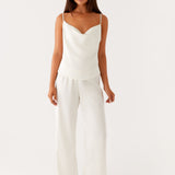 Cream low rise wide leg pants with drawstring waist — Peppermayo | Endless UAE