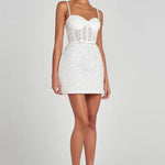 White sequin mini dress with corset bodice and sheer lace detailing on spaghetti straps — Nadine Merabi | Endless UAE