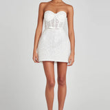Elegant white strapless mini dress with sequin embellishments and sheer corset bodice — Nadine Merabi | Endless UAE