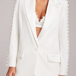 White pearl-embellished blazer and flared trousers co-ord set — Nadine Merabi | Endless UAE