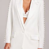 White pearl-embellished blazer and flared trousers co-ord set — Nadine Merabi | Endless UAE
