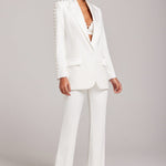 White pearl-embellished blazer and flared trousers co-ord set — Nadine Merabi | Endless UAE