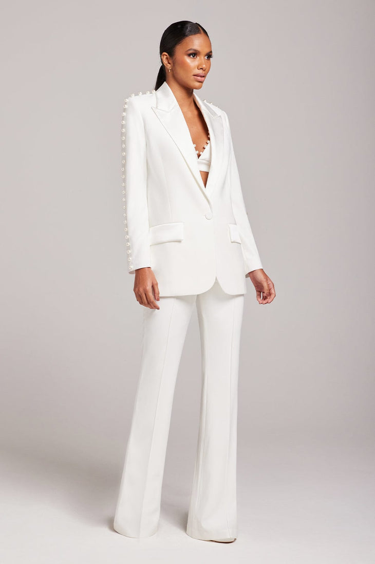 White pearl-embellished blazer and flared trousers co-ord set — Nadine Merabi | Endless UAE