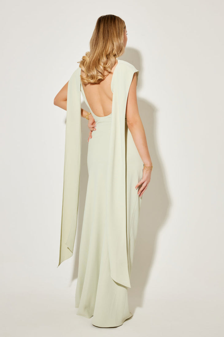 Elegant cream maxi dress with dramatic open back and flowing cape-like drape, fitted silhouette — Odd Muse | Endless UAE