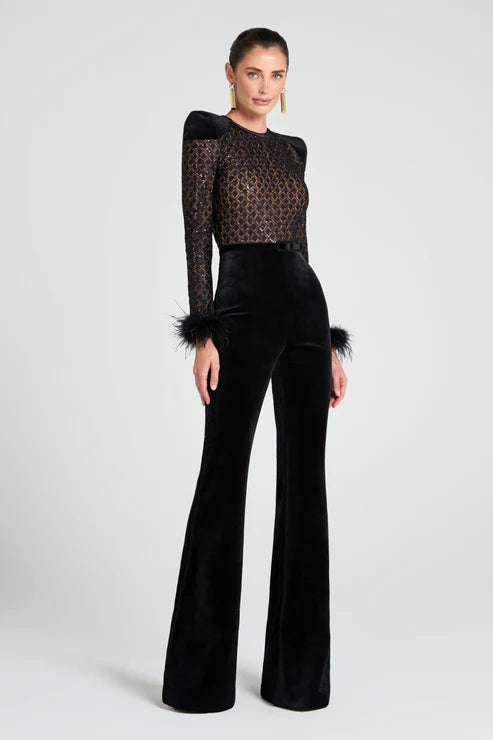 Elegant black velvet jumpsuit with sheer lace top and feather cuff details - Nadine Merabi | Endless UAE