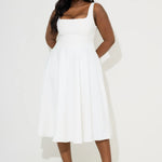 Woman wearing white square neck midi dress with pockets and strappy sandals — Odd Muse | Endless UAE