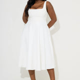 Woman wearing white square neck midi dress with pockets and strappy sandals — Odd Muse | Endless UAE