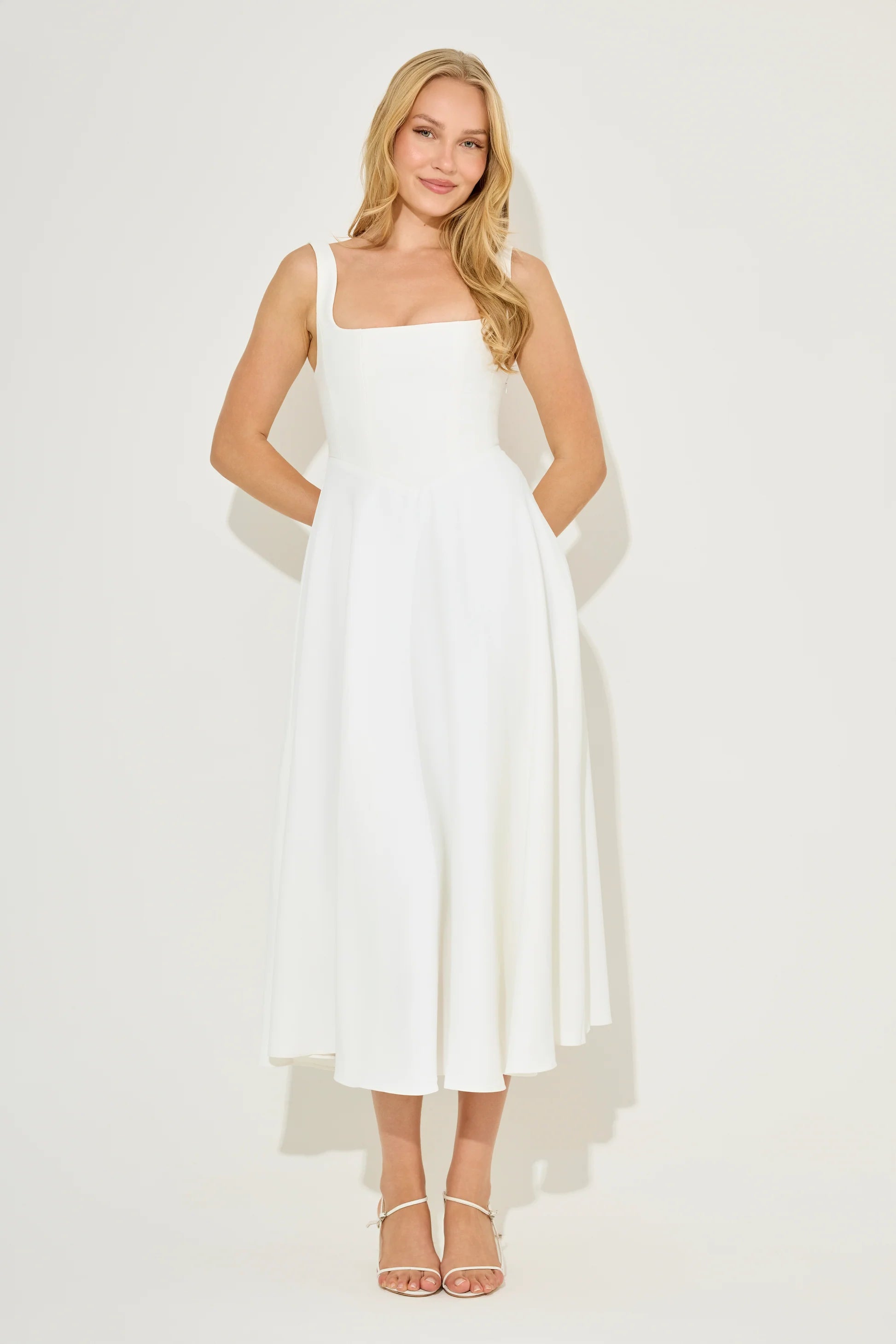 Woman wearing white square neck midi dress with pockets and strappy sandals — Odd Muse | Endless UAE