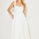 Woman wearing white square neck midi dress with pockets and strappy sandals — Odd Muse | Endless UAE