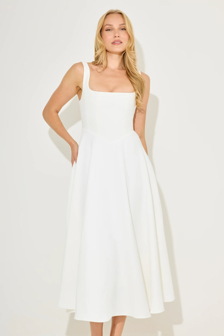 Woman wearing white square neck midi dress with pockets and strappy sandals — Odd Muse | Endless UAE