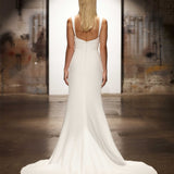 Minimalist ivory crepe mermaid wedding dress with square neckline and cathedral train, back view — You&I Bridal | Endless UAE