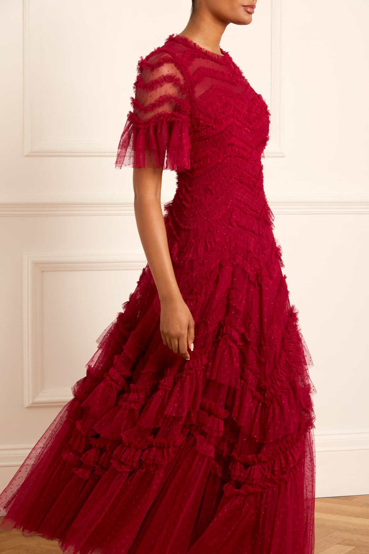 Elegant crimson red tulle gown with intricate lace detailing, ruffled short sleeves, and tiered flowing skirt — Needle & Thread | Endless UAE