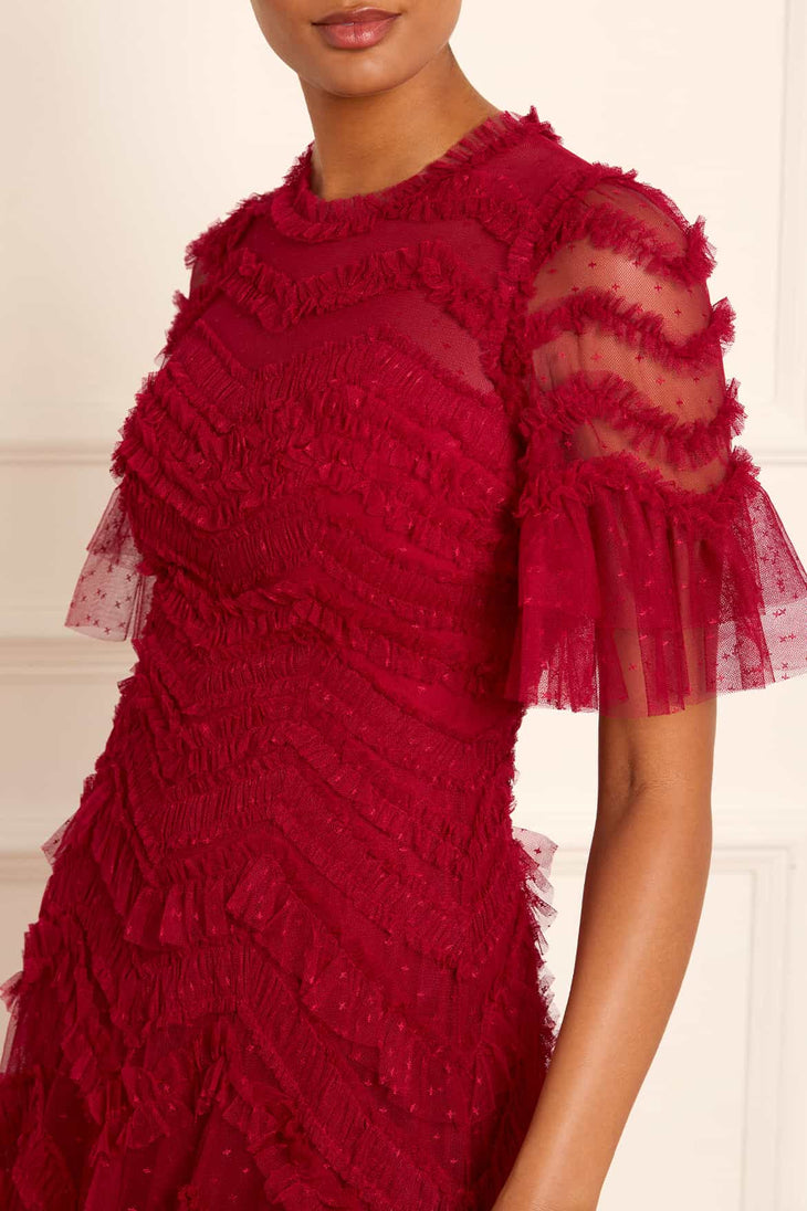 Elegant red evening gown with textured fringe detailing and sheer tulle sleeves — Needle & Thread | Endless UAE