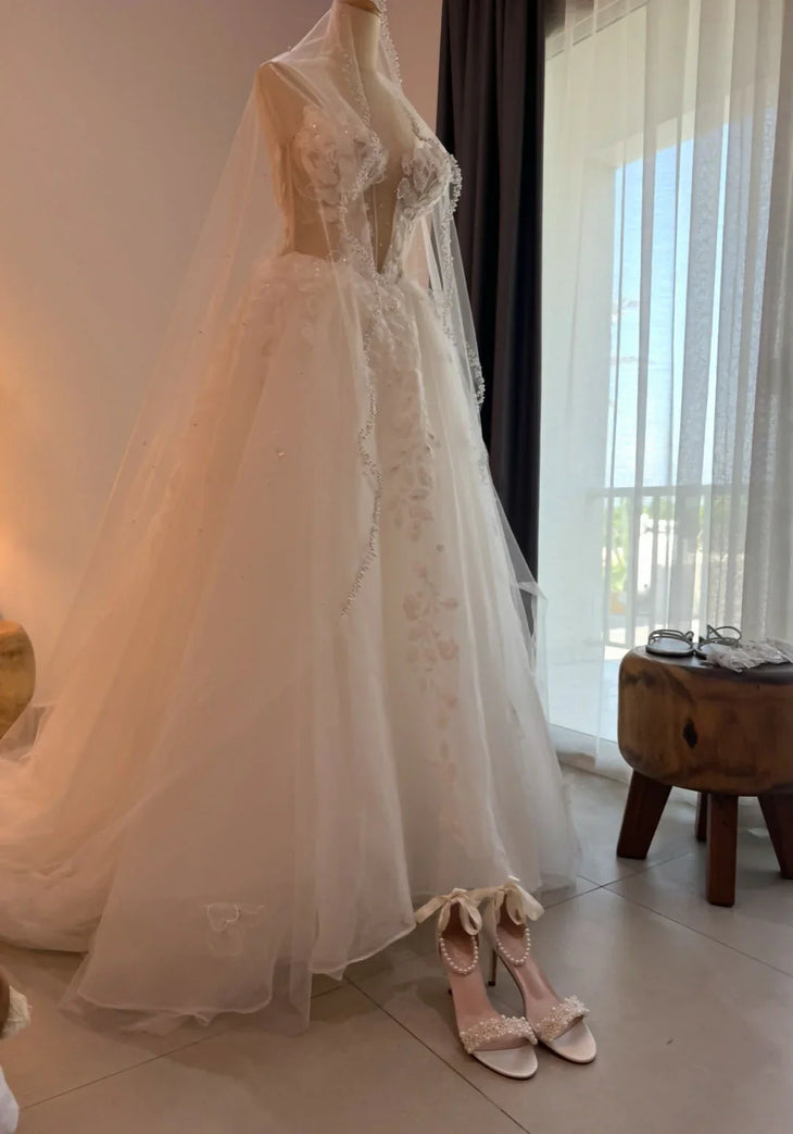 Shayla sleeveless floral appliqué tulle wedding gown with flowing train — Chic Nostalgic | Endless UAE