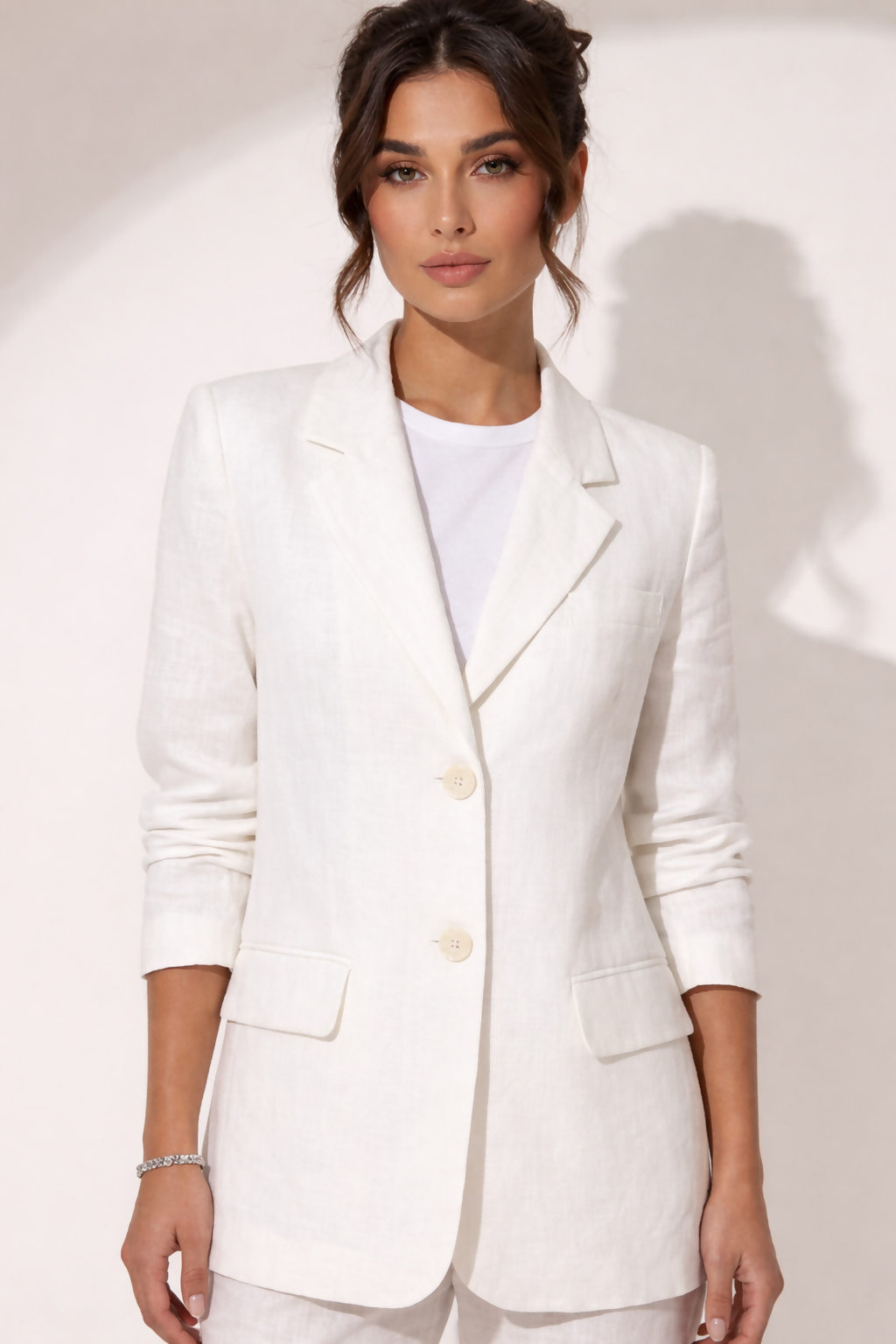 Woman wearing white linen blazer and trousers with white sandals — & Other Stories | Endless UAE