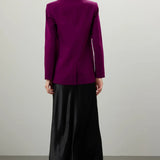 Woman wearing magenta single breasted blazer with black satin maxi skirt viewed from behind — Endless Rose | Endless UAE
