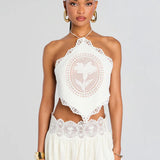 White lace halter crop top and mini skirt set with cutout details — Retrofete | Endless UAE