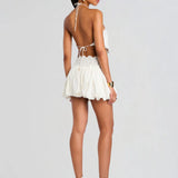White lace halter crop top and mini skirt set with cutout details — Retrofete | Endless UAE