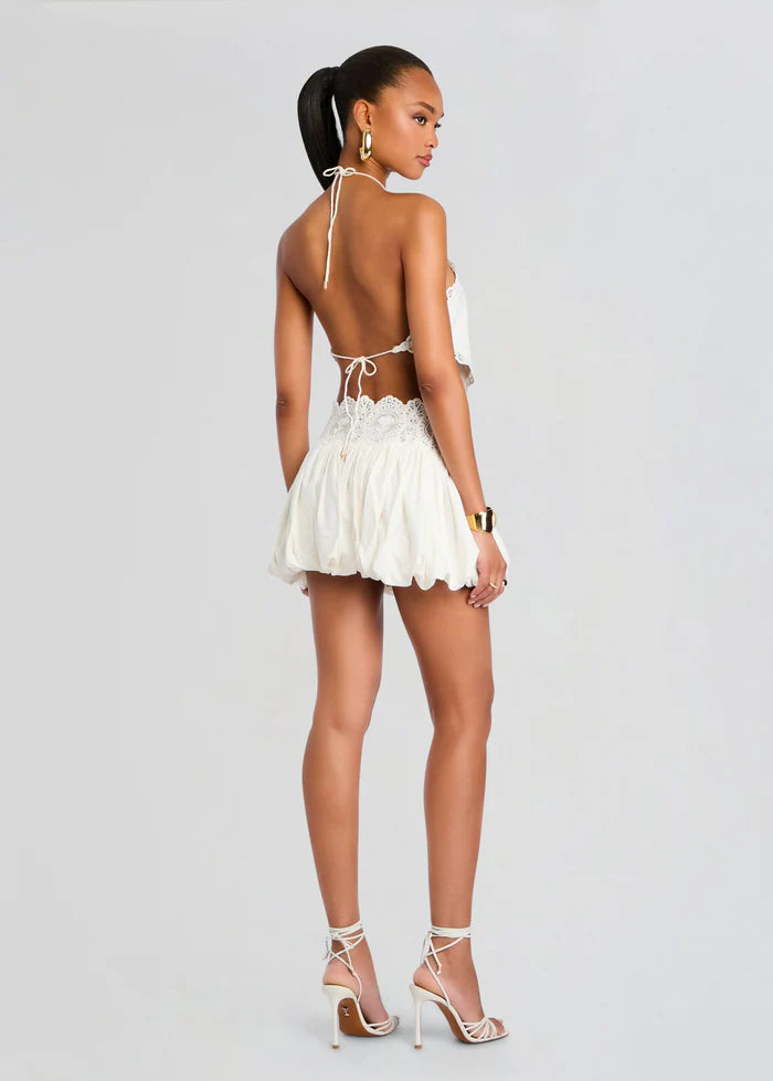 White lace halter crop top and mini skirt set with cutout details — Retrofete | Endless UAE