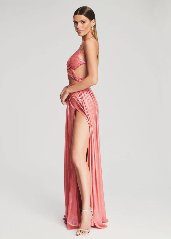 Pink metallic maxi dress with high slit and cutout details, shown from side angle — Retrofete | Endless UAE