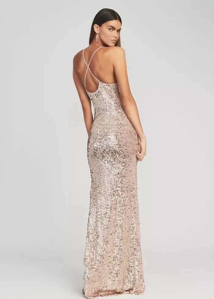 Woman wearing champagne sequin crochet halter maxi dress with high slit — Retrofete | Endless UAE