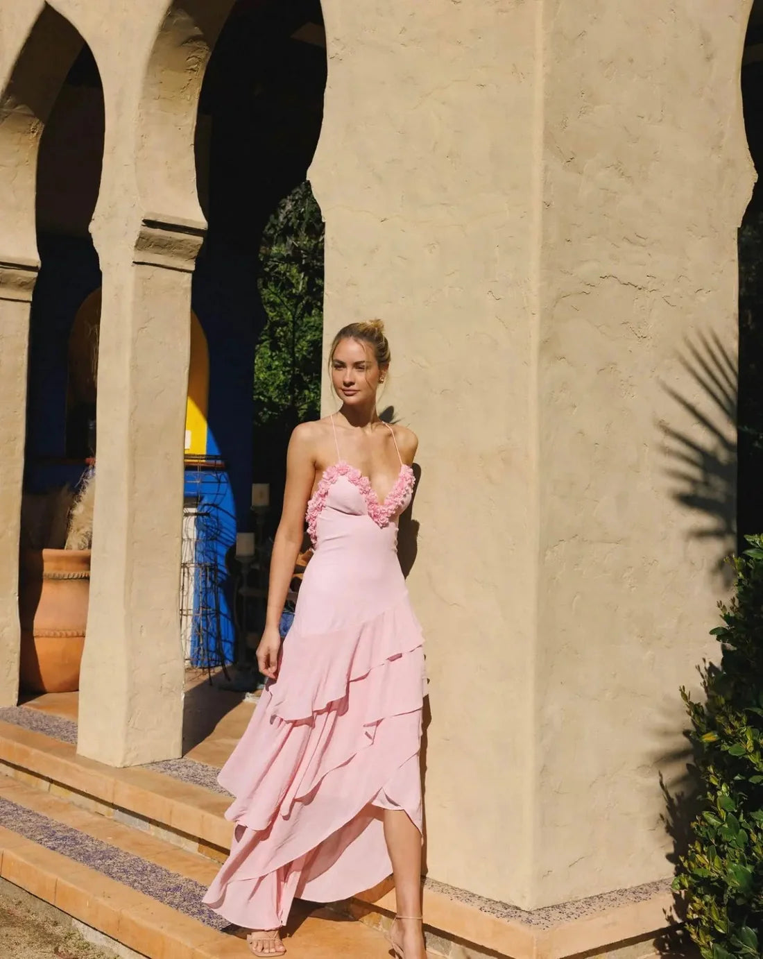 Elegant pink ruffled maxi dress with floral embellished bodice and flowing tiered skirt — Anne Louise Boutique | Endless UAE