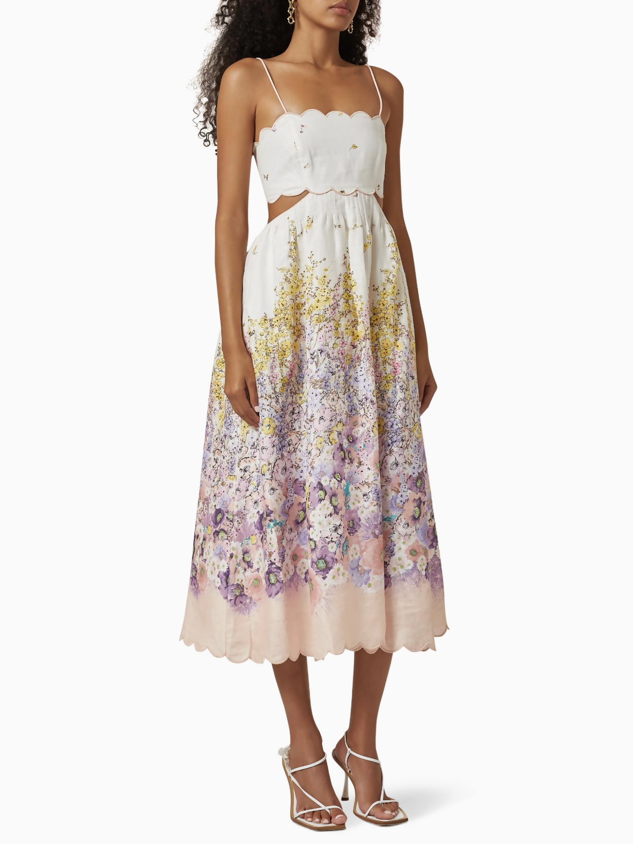 Floral print midi dress with scalloped edges, cutout waist detail, and thin straps in cream with purple-yellow blooms — Zimmermann | Endless UAE