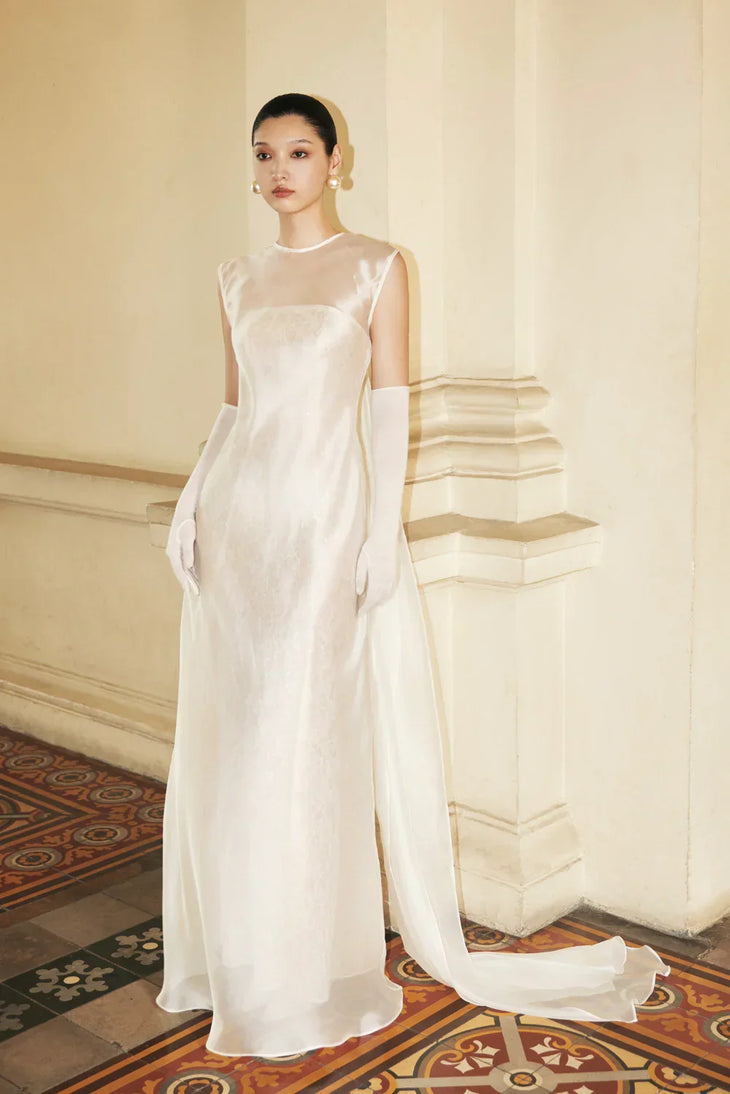 Merrily Dress in ivory crepe with sleeveless design and flowing train — Huong Boutique | Endless UAE